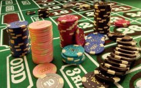 rumahduit live dealer studio with multiple camera angles broadcasting blackjack table
